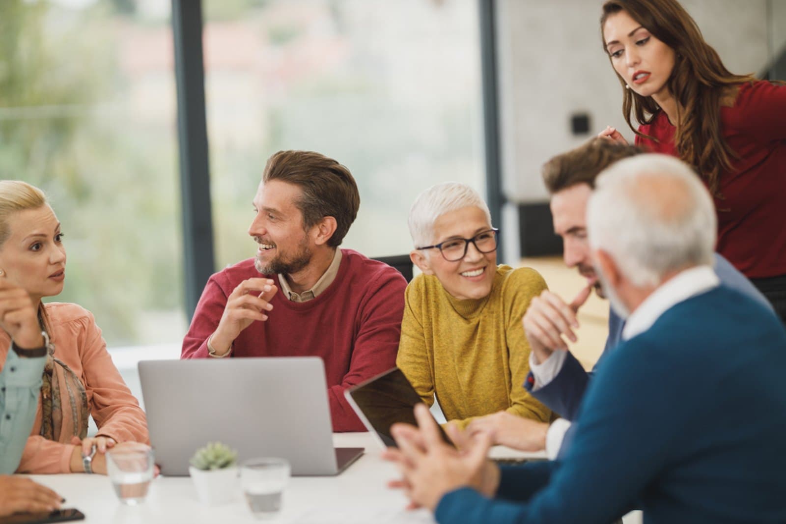 Team working through a hiring plan in a modern office